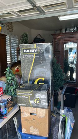 Kirby vacuum cleaner w/ carpet shampooer attachments