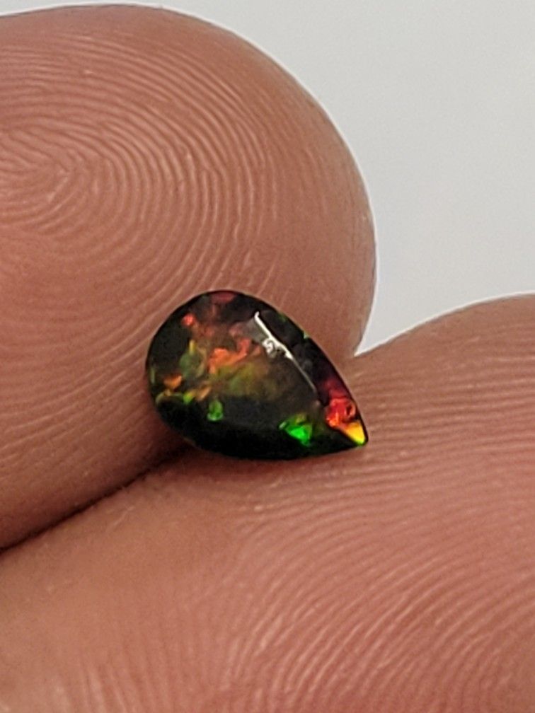 .75ct Ethiopian Black Fire Opal Loose Pear Cut Genstone. 