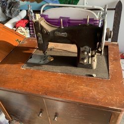 Antique Sewing Machine And Cabnet