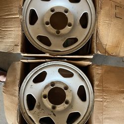 4 geo tracker stock rims - $100 for all 4