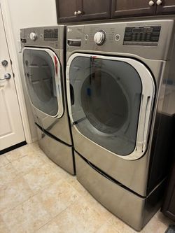 LG Washer and Dryer front load with pedestals