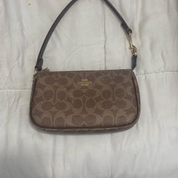 brown coach hand bag