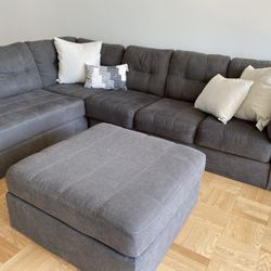 Gray Sectional & Ottoman From Jennifer Convertibles