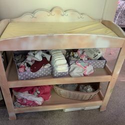 Pink and white changing table