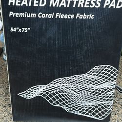 Heating mattress pad