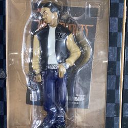 This 2011 action figure from Starlight Studio features the character ISH from the TV show Gangster Chronicles. The figure comes with green glasses and