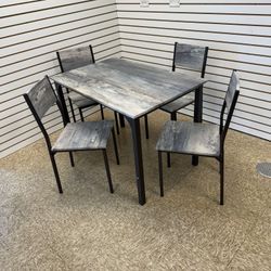 Table And 4 Chairs 