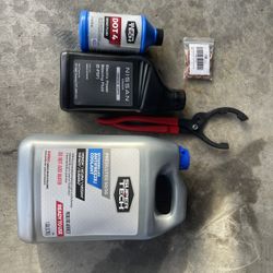 Nissan maintenance coolant,E-power steering fluid ,oil filter wrench, oil drain gasket.