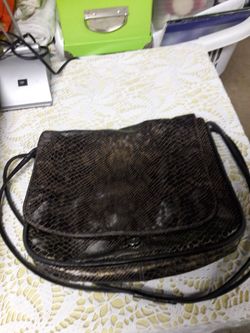 Brown leather purse by SHARIF in usa