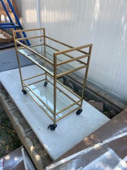 Car with 2 glass panels and 2 wheels with locking mechanism