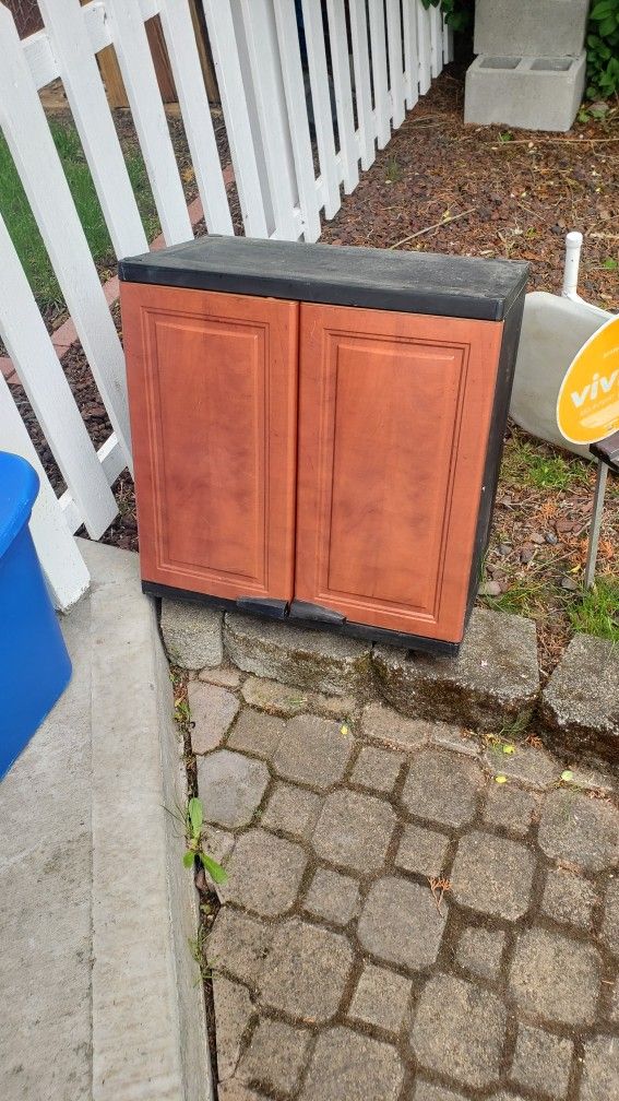 plastic cabinet w/ shelf