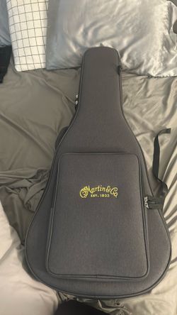 Martin SC-10E Brown Acoustic/Electric with built in tuner. Comes with case
