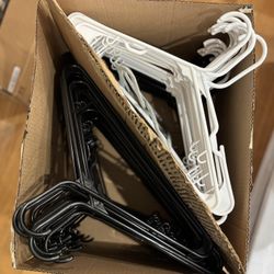 Black and White Plastic Clothing / Coat Hangers - Roughly About 100 Total