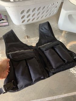 Weighted vest (I don't know how much it weighs but it is heavy)