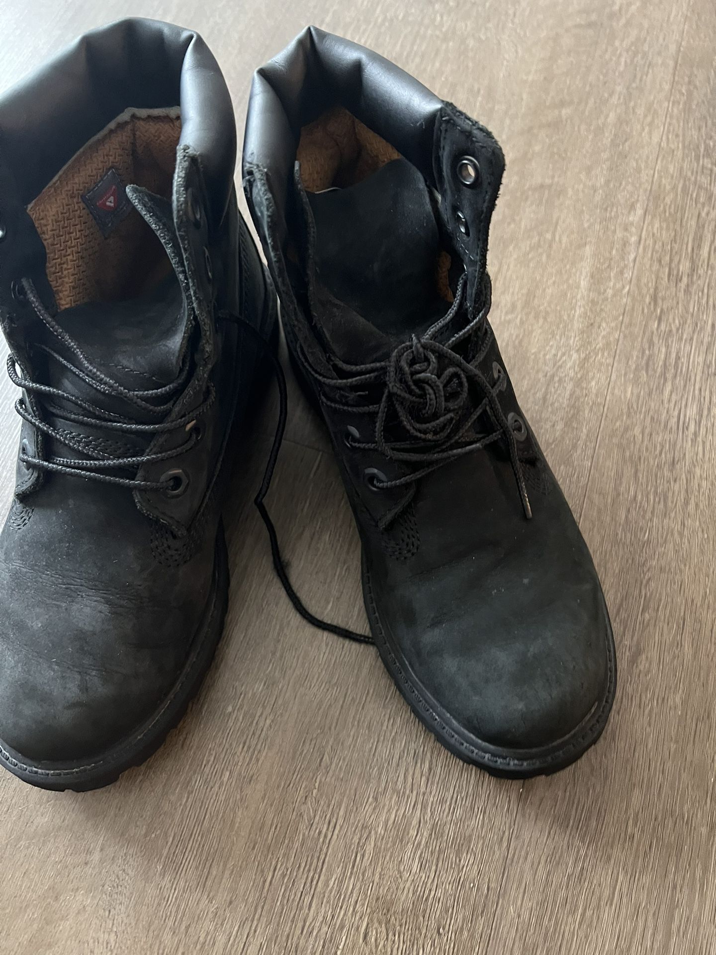 All black timberlands field boots