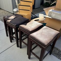 4 brown leather bar stools