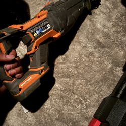 Rigid Sawzall Used With Charger And Two Batteries 