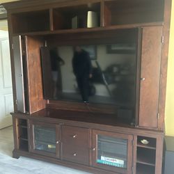 Wooden Entertainment Center With TV