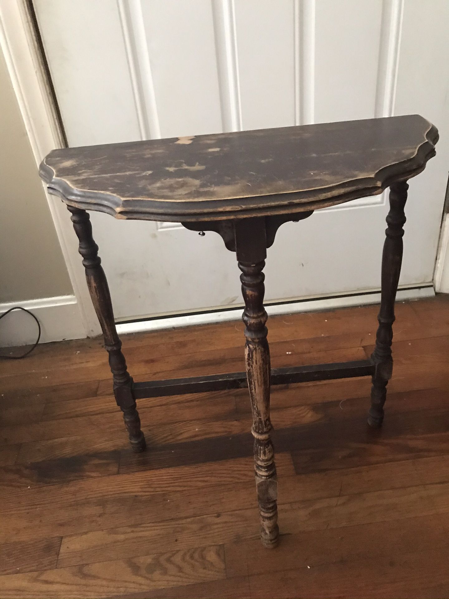 Antique half-moon table