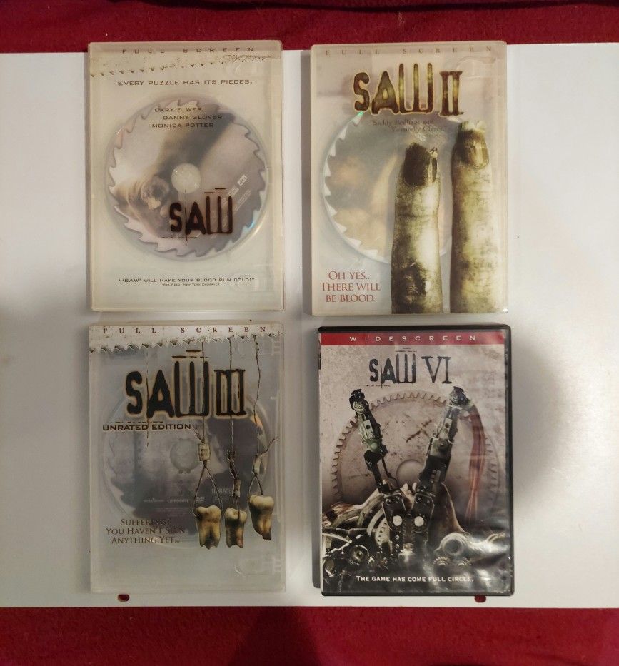 Set Of 4 SAW Movies SAW 1 DVD SAW 2 SAW 3 DVD CLEAR COLLECTORS EDITION & SAW 6 DVD PLUS FREE DVD COPY OF SAW 4 & SAW 5