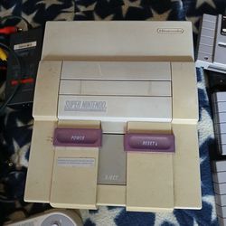 Throwback Super Nintendo With Four Games Controllers And Hookups