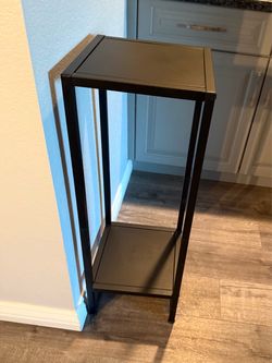 Black metal stand