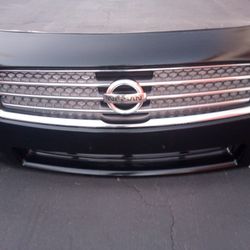 2009-2014 Nissan Maxima Front Bumper With All The Accessories Oem.