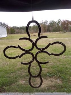 Cross Made Out Of Horse Shoes