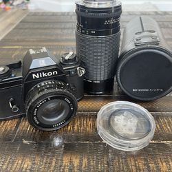 Nikon EM Camera, Case And Lens 