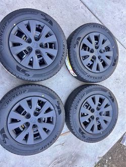 Set of 15 inch new tires on Honda Rims 5x114