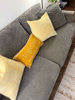 Gray Fabric Sofa with Quilted Cushions
