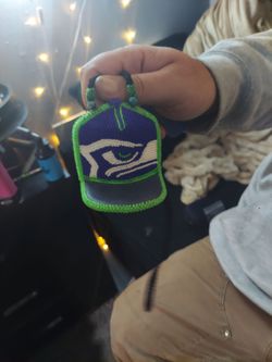 Handmade native beadwork with leather back and leather bill