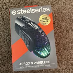 Steel series Aerox 9 Wireless Ultra Lightweight Honeycomb Water Resistant RGB Optical Gaming Mouse With 18 Programmable Buttons - Wireless - Black