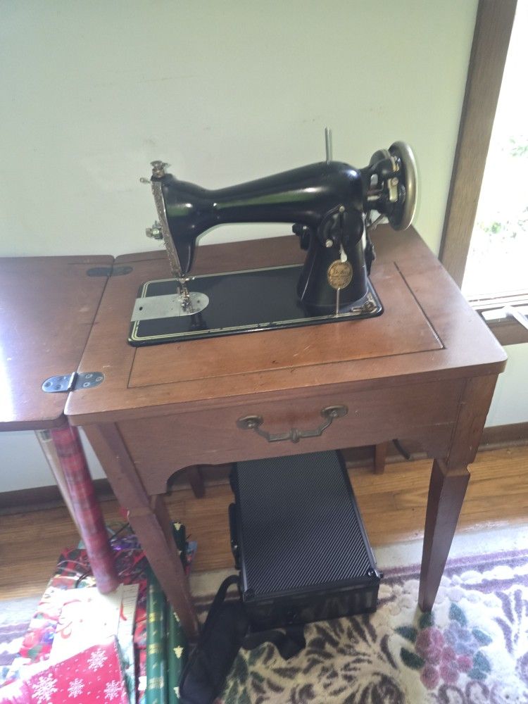 Two Sewing Machine Tables