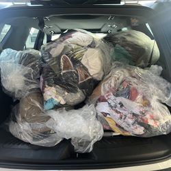 Large bags mixed items women’s clothes towels bags