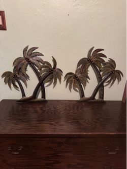 Two metal palm tree wall art