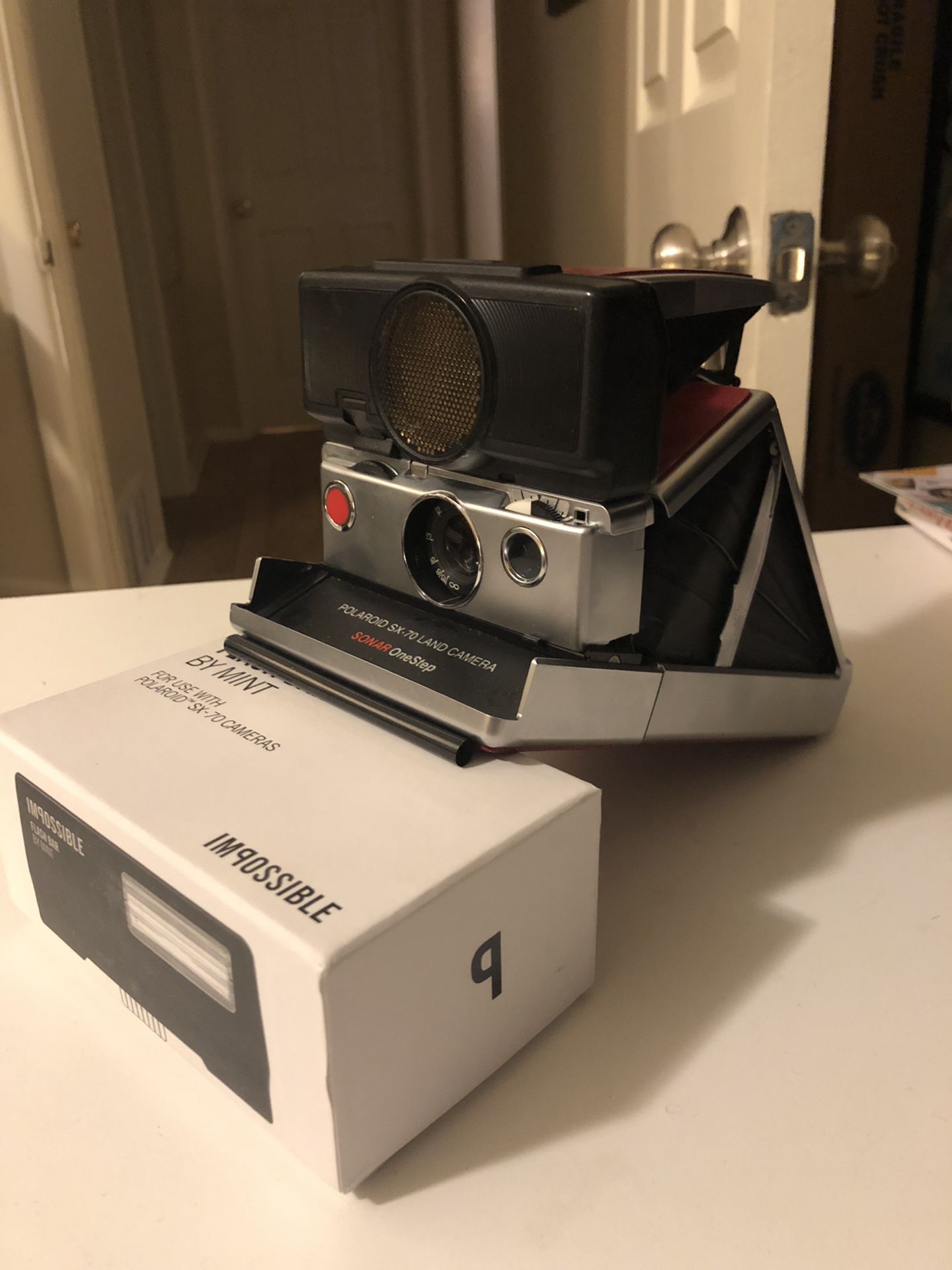 Polaroid SX-70 land camera with rangefinder focus and Flash Bar