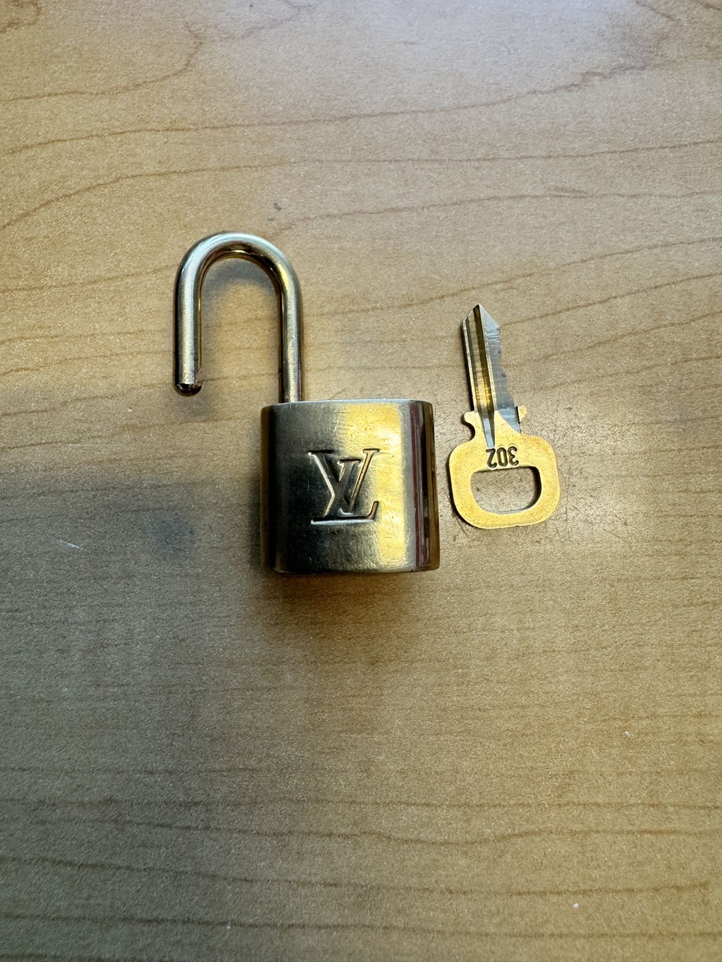 Louis Vuitton Gold Padlock with Key # 302