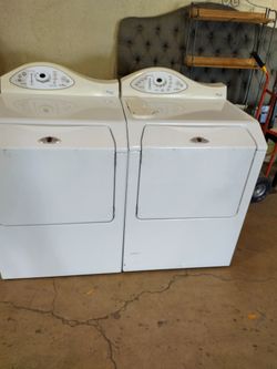 Maytag Neptune washer and electric dryer set 