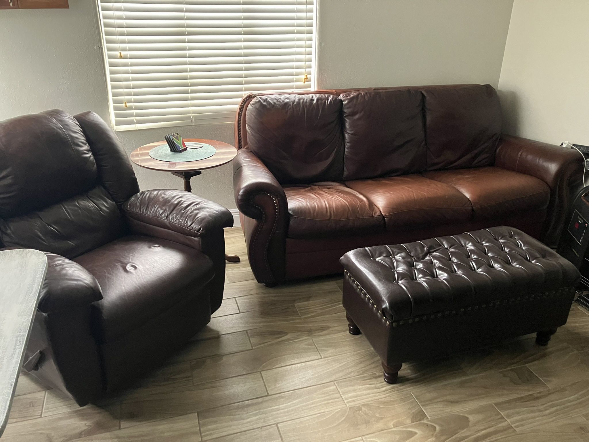 Leather Couch, Recliner And Storage Ottoman