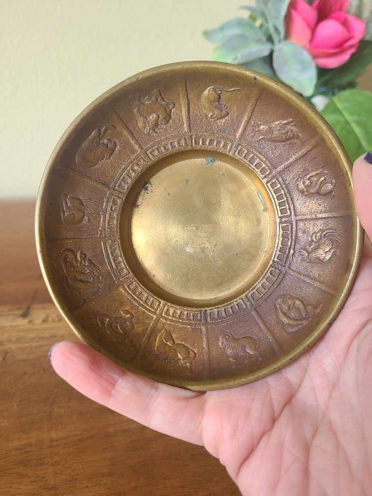 Vintage brass Chinese zodiac trinket tray or candle holder