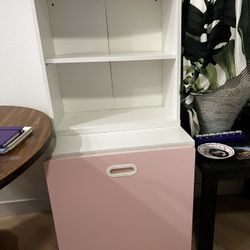 White Two-Shelve Bookcase With Pink Drawer For Storage And Hidden Shelf