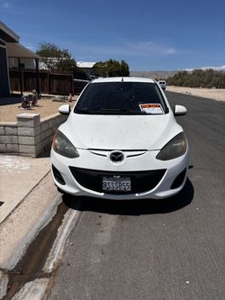 2014 Mazda 2 with 130,000 miles
