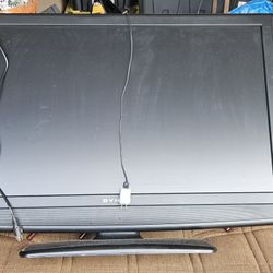 TV Dynex And Entertainment Center