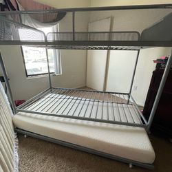 Twin bed with pull out bed