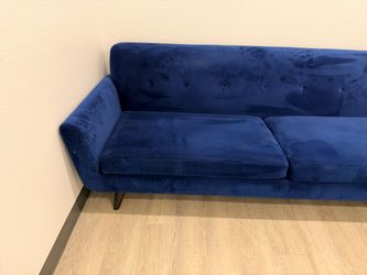 Blue sectional couch with chaise lounger