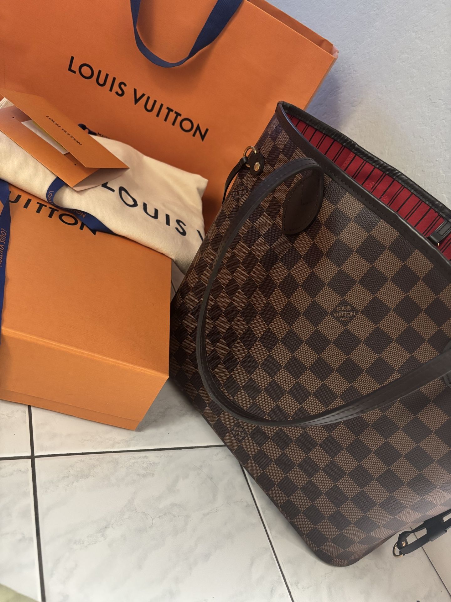 Authentic Louis Vuitton Never full MM.
