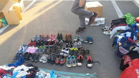 Boys clothes ,shoes,books toys half of garage full