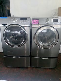 Samsung front load washer and electric dryer set with pedestals working perfectly with 4 months warranty