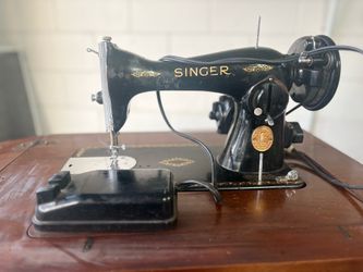 Vintage Singer sewing machine built in table